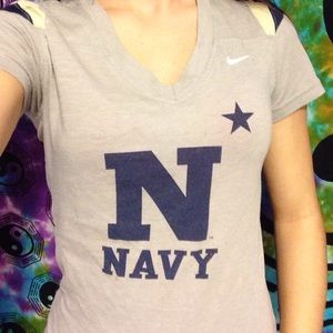 A Navy by Nike short sleeve shirt.