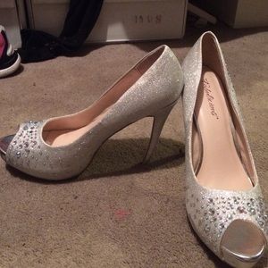 Fabulicious, silver, open-toed heels. Size 10