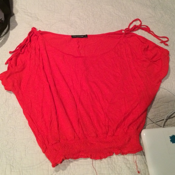 Over shoulder red top