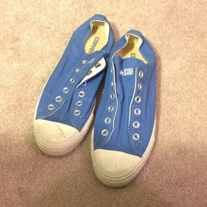 Slip on Blue Converse All Stars.