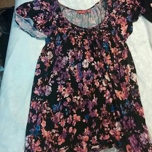 Bright floral blouse.