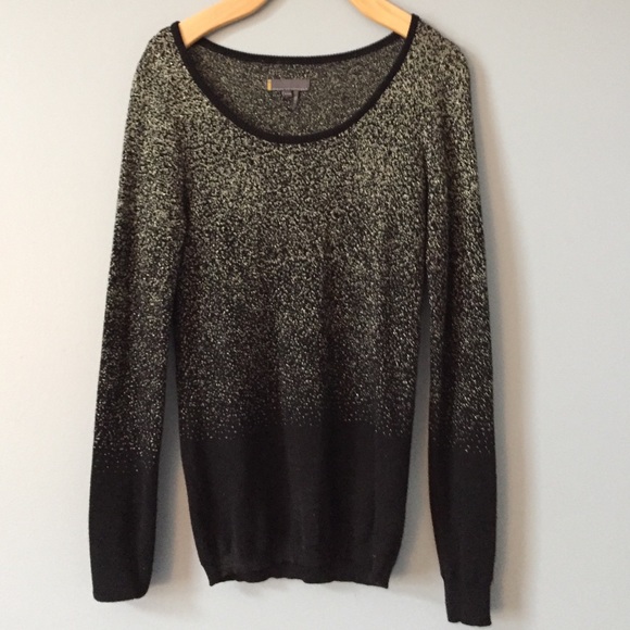 Black and gold sweater.