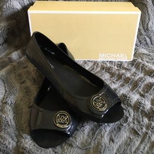 Michael Kors peep toe flats.