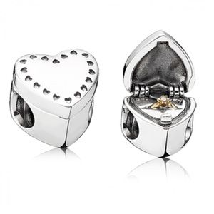 Pandora "Ring in a Heart" charm.