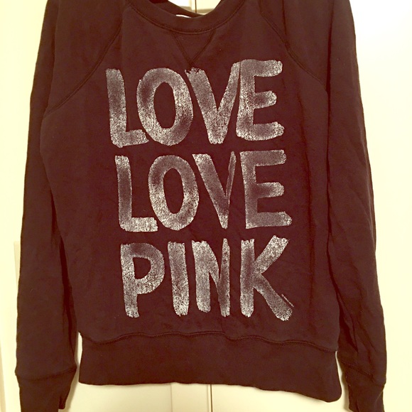 Black, pullover Pink sweater.