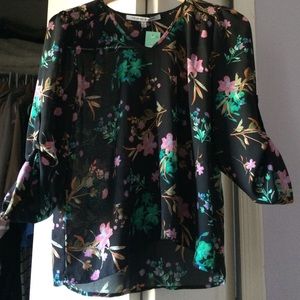 Collective Concepts v-neck blouse. New with tags.