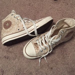 Gold and cream high top converse sneakers