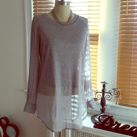 Sheer/solid hi-low top