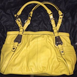 B. Makowsky yellow satchel bag