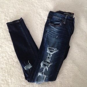 Dark denim distressed American eagle jeans
