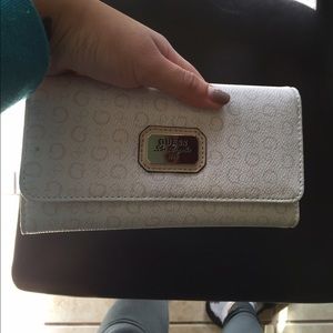 Cream and light pink Los Angeles Guess wallet