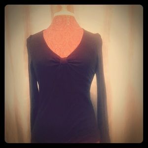 Black, long sleeve shirt.