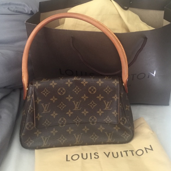 100% Authentic Louis Vuitton Looping bag