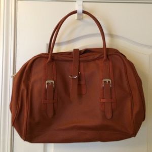 Estée Lauder Tobacco colored handbag