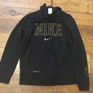 Black and gold Nike therma fit