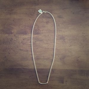 NWT 33" long curved bar necklace. Gold tone.