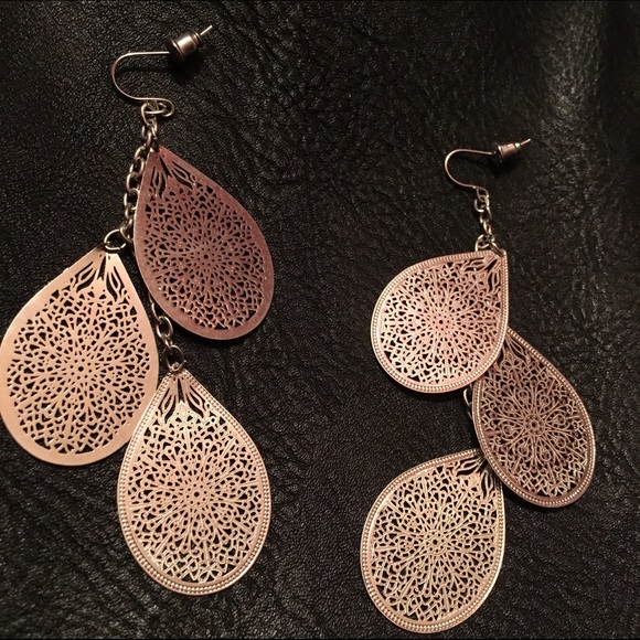 set of dangly earrings with design