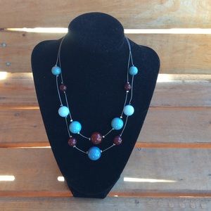 Tin cup bead necklace
