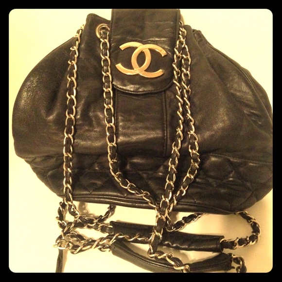 Quilted black faux leather satchel with gold chain