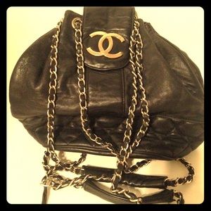 Quilted black faux leather satchel with gold chain