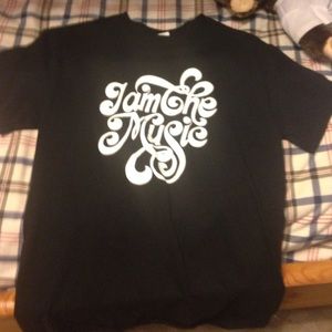 A black tee shirt can be for men or women