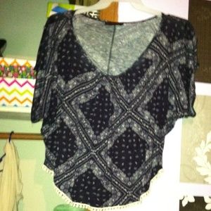 blue printed top with trim on bottem