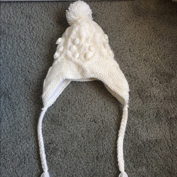 Cozy knit hat with Pom Pom and tassels