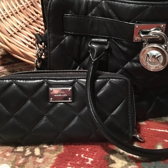 Black Michael Kors purse and matching wallet