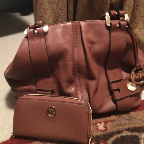 Brown Michael Kors purse and wallet