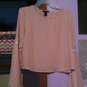 sheer pink crop top with bell bottom sleeves