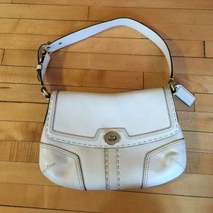 Off white leather coach handbag