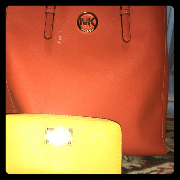 Orange purse and bright yellow wallet.