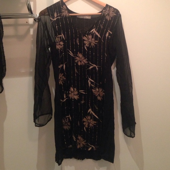 "What goes around comes around" sheer tunic