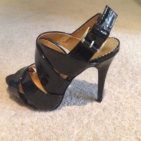 Black Patent leather Report Signature platforms