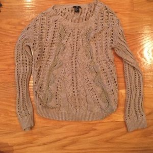 Cable knit sweater with holes