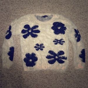 Fuzzy sweater. White with black flowers
