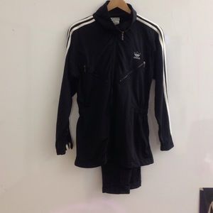 Vintage black Adidas tracksuit with 3/4 jacket.