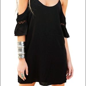 Brand new off-the-shoulder black dress