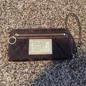 Brown Coach wallet wristlet