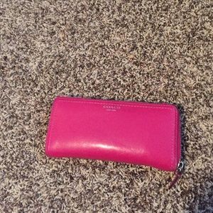Pink Coach leather accordion wallet
