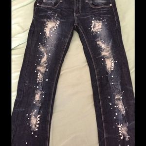 Distressed jeans with pearl and rhinestone detail