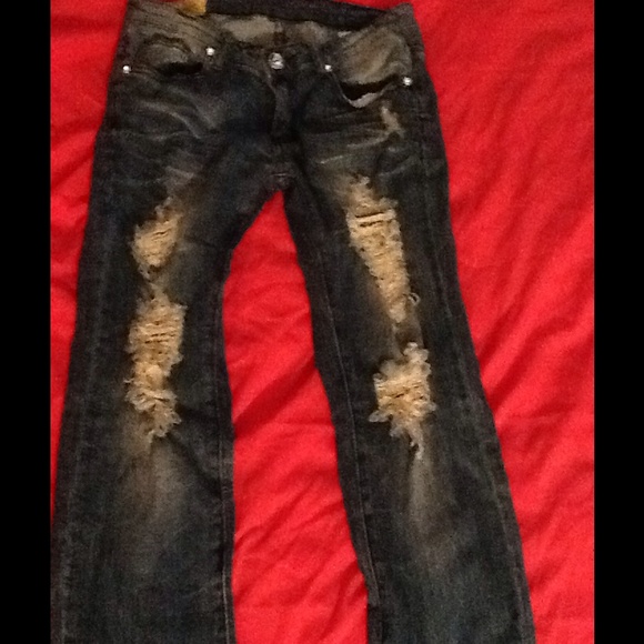 Distressed Machine Jeans