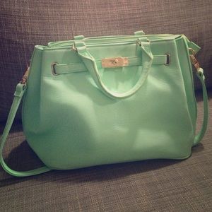 Mint green purse by Happy Blue. Never been worn.