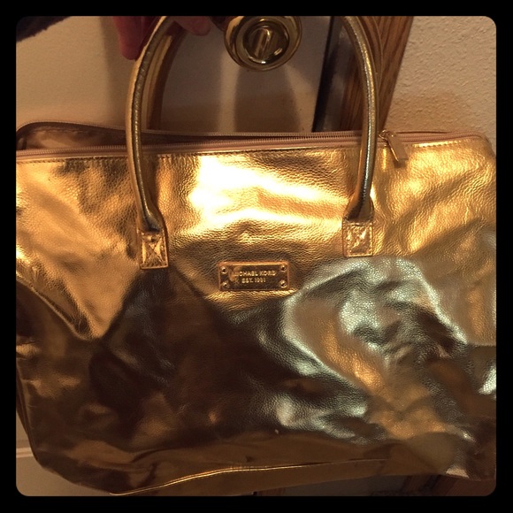 Gold Michael Kors weekend bag