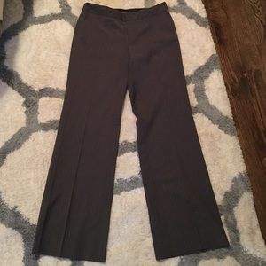 Grey dress pants with white and blue stripes.