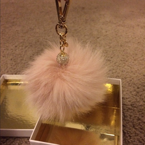 Brand new Michael kors fox tail key chain