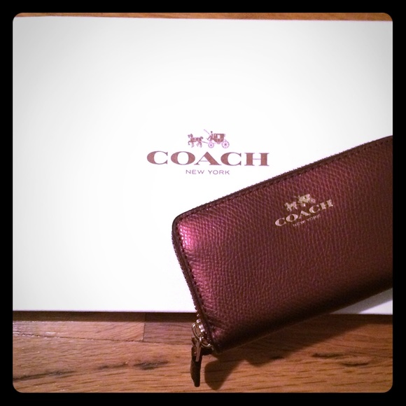 Coach Plum Colored Wallet