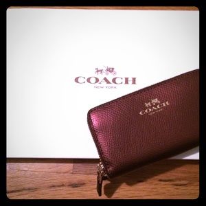 Coach Plum Colored Wallet