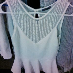 White Sleeveless shirt size small