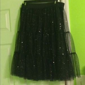 Large black mid length sequin skirt